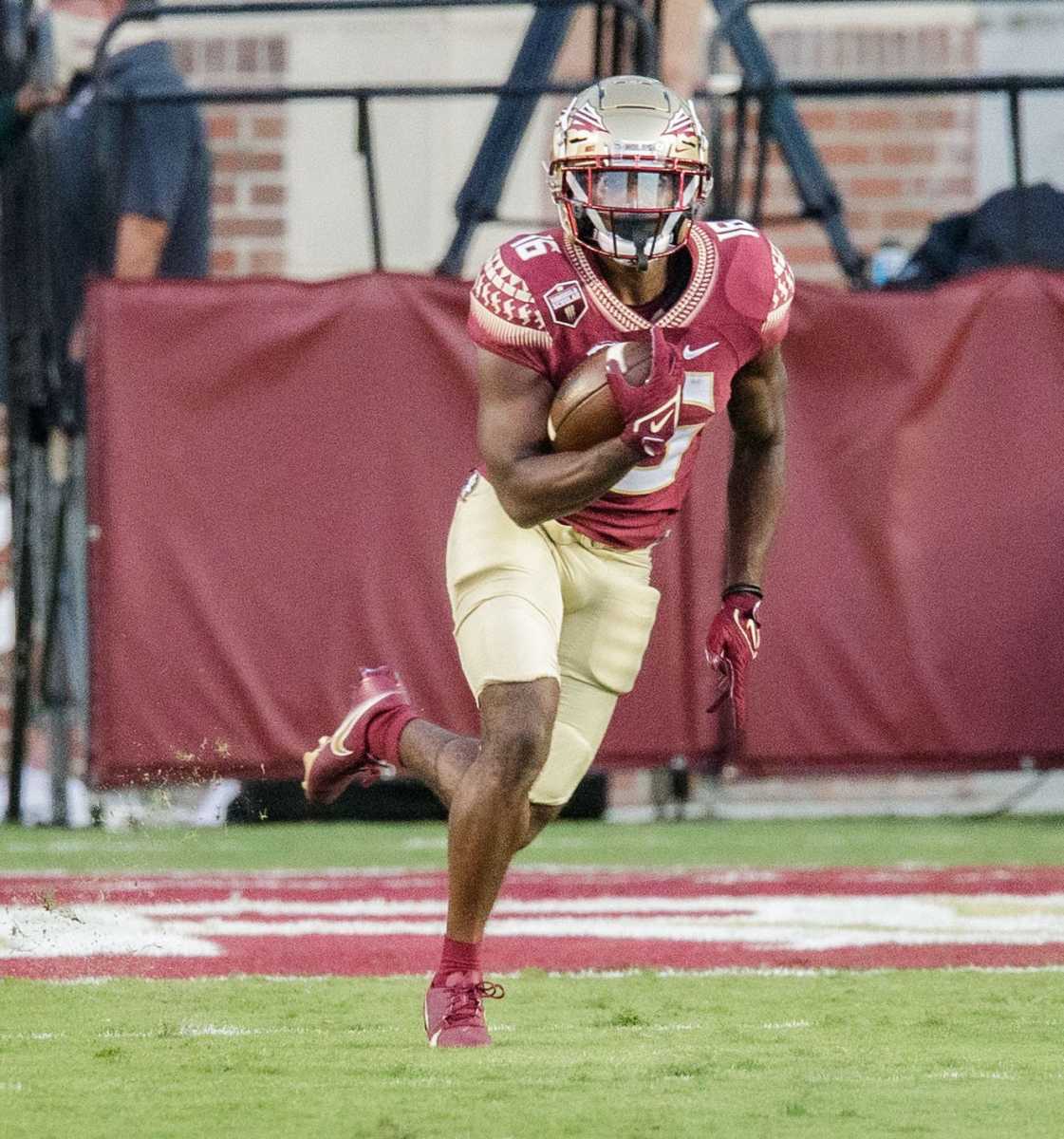 Florida State Seminoles running back Corey Wren (16) runs the ball down the field. The Notre Dame Fighting Irish lead the Florida State Seminoles 17-14 at the half Sunday, Sept. 5, 2021.
